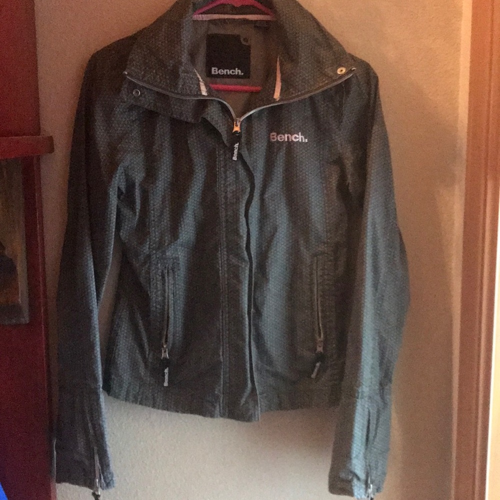 Pink accent rain jacket